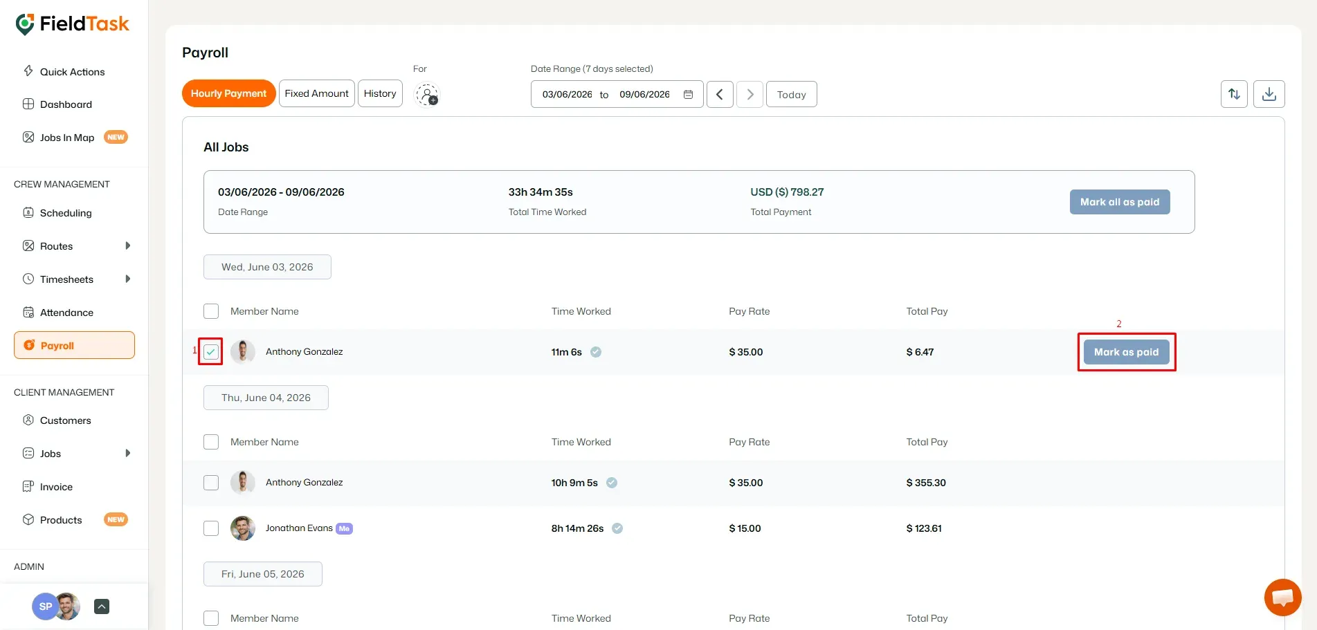 FieldTask hourly payroll page with member checkbox selected and Mark as paid button highlighted